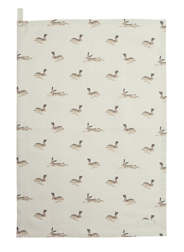 Sophie Allport Hare Cotton Tea Towel. Hares racing around a light Beige coloured Tea Towel