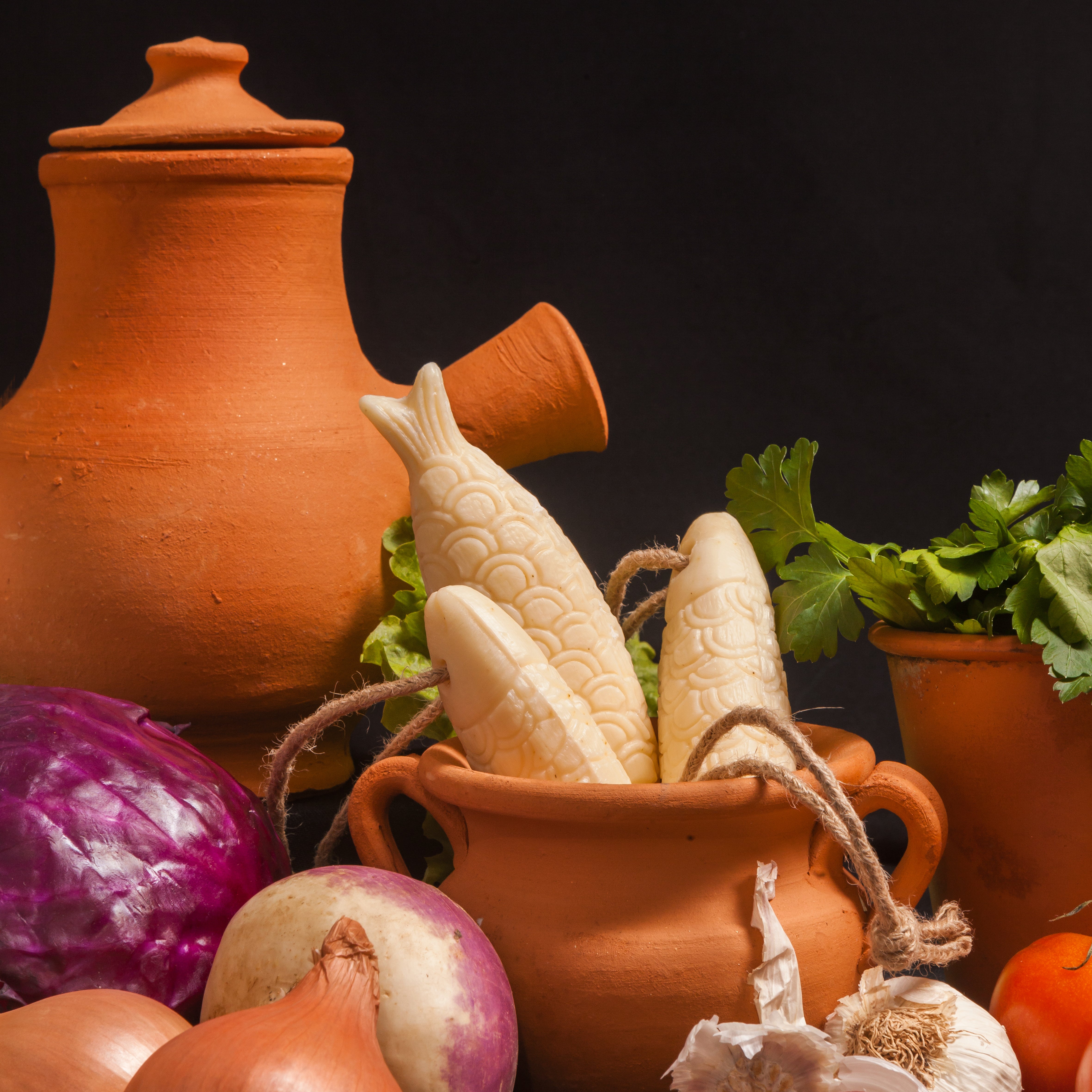 Savon en forme de sardine sur une corde