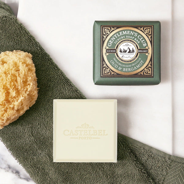Gentlemen's Club Oud & Bergamot Soap 150g - Castelbel - Small square soap in Dark Green decorative packaging. Lifestyle Photo