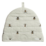 Sophie Allport Bees Beehive Cotton Tea Cosy. Bees on a very pale green background